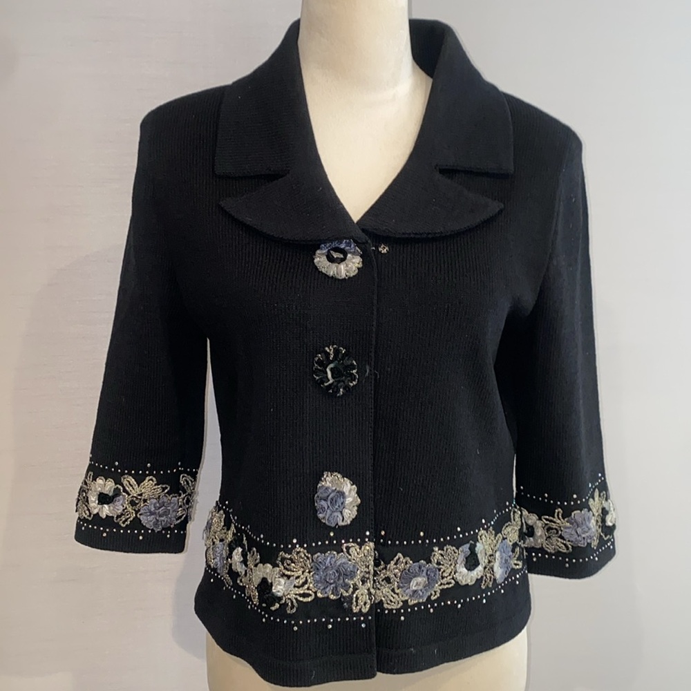 Black Knit jacket with delicate embroidery.